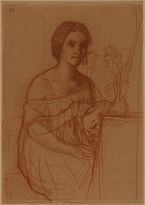 Une femme assise, peignant un vase