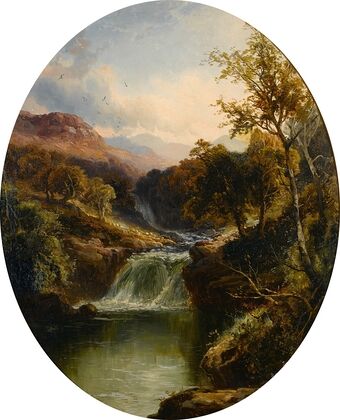 Verdant landscape by a river fall