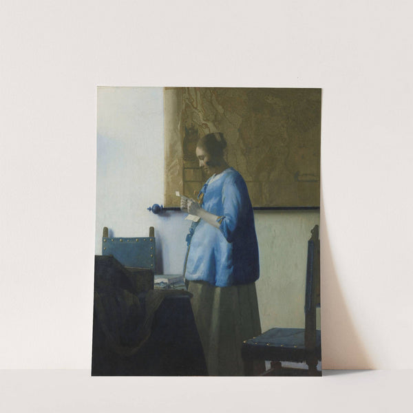 Woman Reading a Letter by Johannes Vermeer