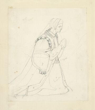 Woman wearing veil kneeling in prayer