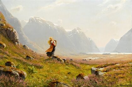 Young girl on a summer alpine stroll