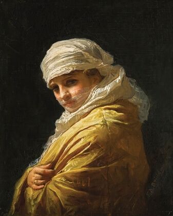 Young woman in a white turban