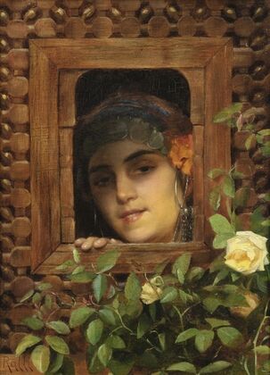 Young woman looking out the window