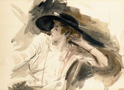 Young woman wearing a large hat
