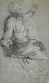 A bearded man, seated, his left arm raised