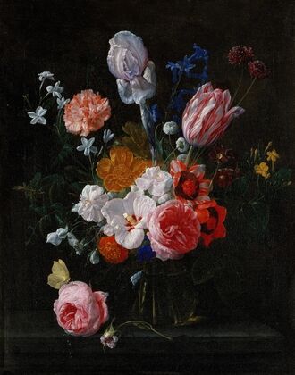 A Bouquet Of Flowers In A Crystal Vase