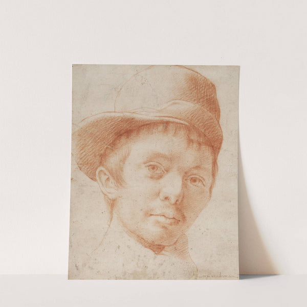 A boy wearing a workman&#039;s hat by Cristofano Allori