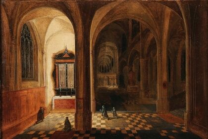 A church interior with worshippers at prayer