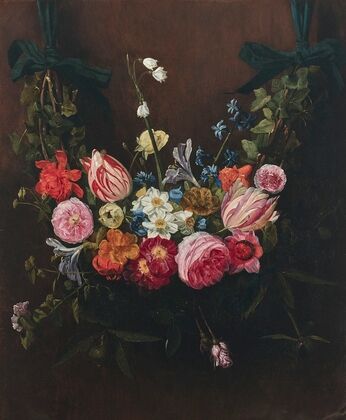 A garland of flowers with tulips, daffodils, lilies of the valley suspended from ribbons