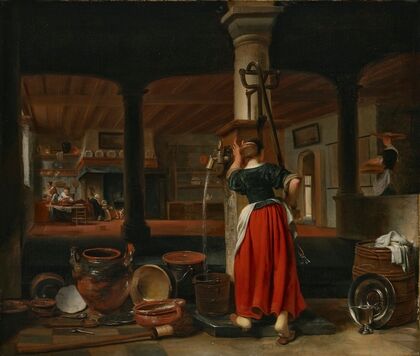 A maid pumping water in a kitchen interior