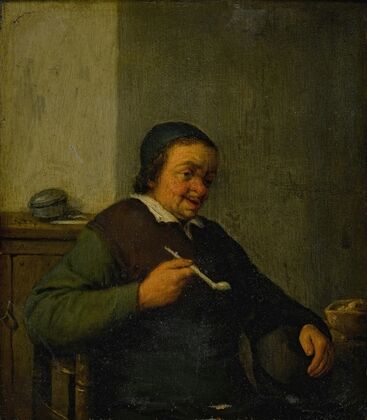 A man smoking in an interior