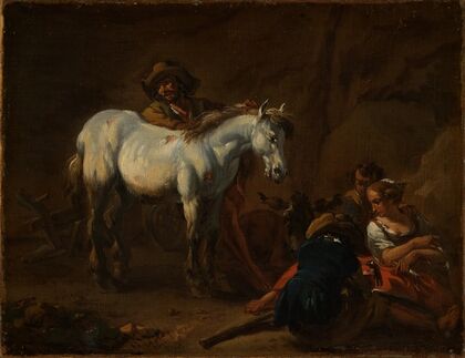 A man with a white horse
