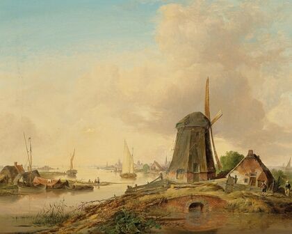 A river landscape with a windmill