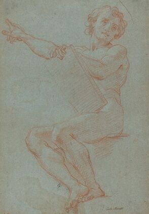 A Seated Man Holding a Tablet