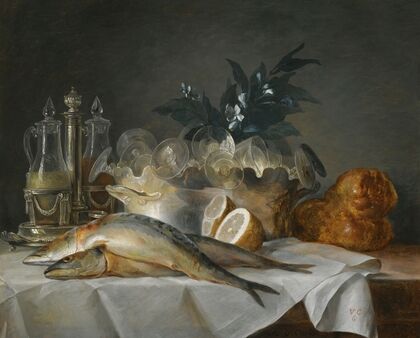 A Still Life Of Mackerel, Glassware, A Loaf Of Bread And Lemons On A Table With A White Cloth