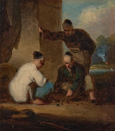 A street scene in Macau with three men gambling