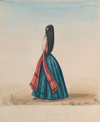 A woman wearing the saya and manto standing in profile