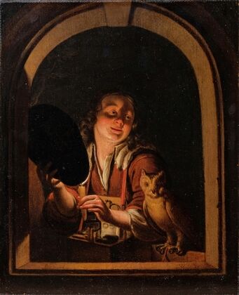 A young boy with a owl