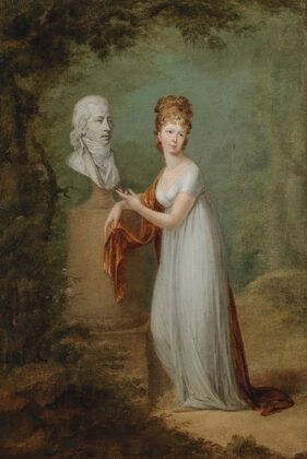 A Young Lady By Her Husband’S Bust In A Park