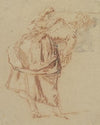 A Young Woman Looking in a Mirror