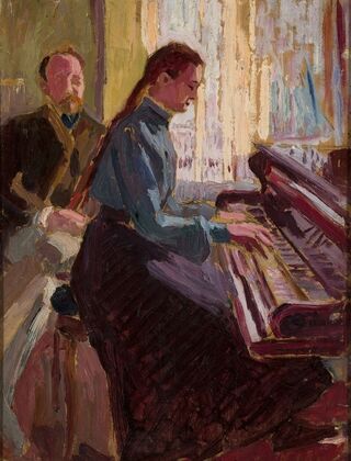 At the piano