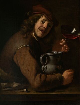 Boy drinking wine