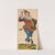 Carnival figure dressed as a jester with a glass of beer and a marotte by René Ackermann