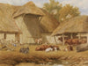 Cattle resting beside farm buildings