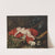 Cupid sleeping beside hunting paraphernalia with two guinea pigs in the foreground by Bartolomeo Guidobono