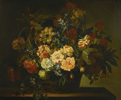 Dahlias, Tulips, Honeysuckle and other flowers in a basket on a table