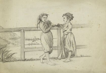 Deux fillettes devant une barrière de bois