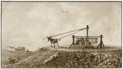 Een waterput met raderwerk en trekezel