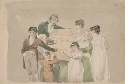 Family group – Smith, his wife and six children pointing at examples of their work