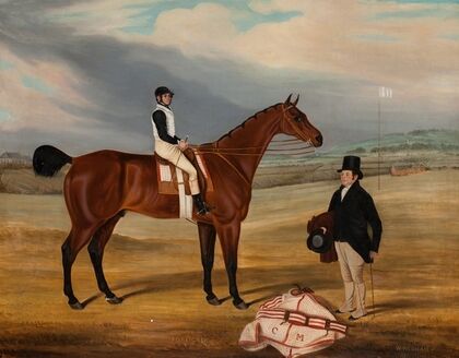 Foreigner with jockey up and his owner standing to the right