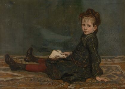 Girl sitting on a carpet