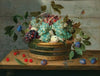 Grapes, peaches, plums and cherries in a wicker basket with dragonfly and butterfly nearby