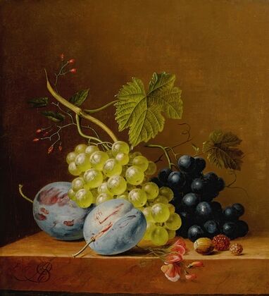 Grapes, plums, raspberries, flowers and an acorn on a wooden ledge