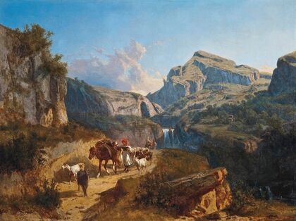 Herding goats on a mountain pass