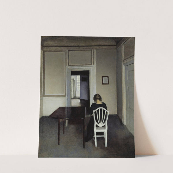Interior With Ida in A White Chair by Vilhelm Hammershøi