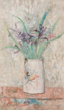 Irises in a white flower-vase