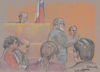 Lawyer speaking in front of judge, witness and others during trial of Yolanda Saldivar for the murder of the singer Selena