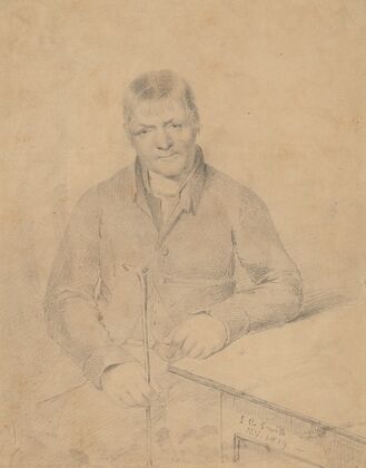Man Seated at a Table