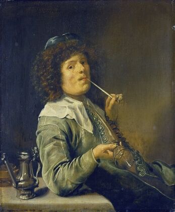 Man Smoking and Holding an Empty Wine Glass