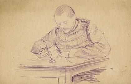 Militaire assis à un bureau écrivant