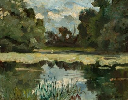 Park landscape with a pond