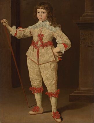 Portrait of a boy with walking stick