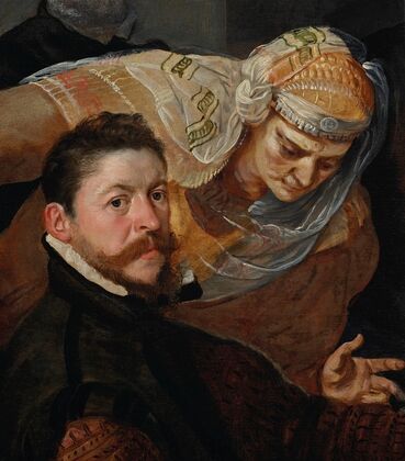 Portrait of an artist, seated, with a woman leaning over his shoulder