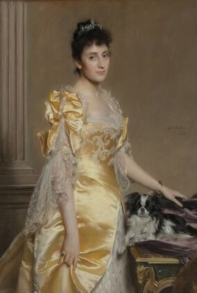 Portrait of an elegant woman with a Papillon spaniel
