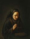 Praying old woman