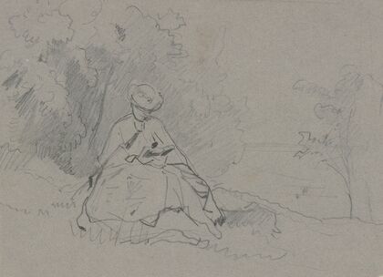 Reading woman in the outdoors